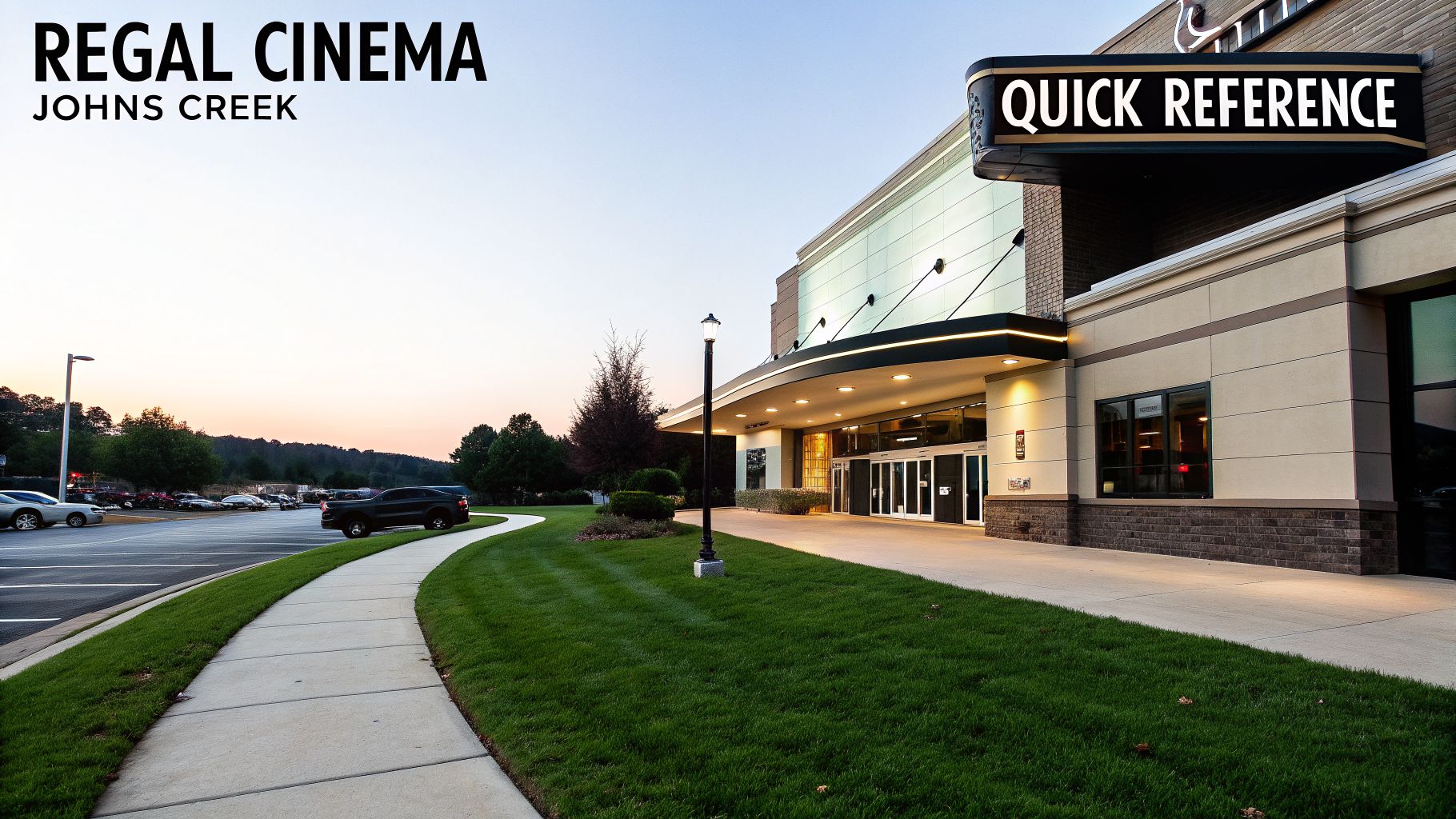 Exterior shot of Regal Cinema Johns Creek at sunset, featuring the entrance, Quick Reference sign, and parking lot.