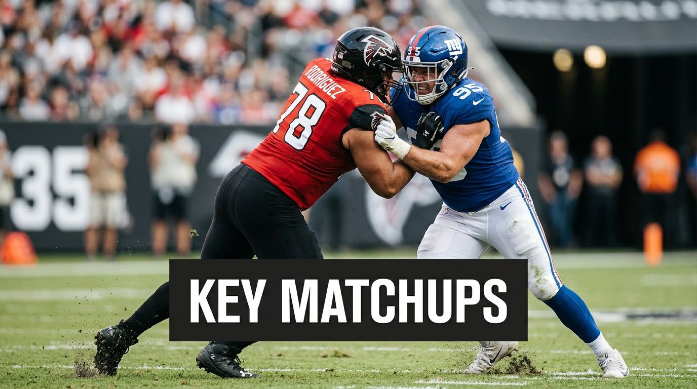 An intense physical block between an Atlanta Falcons offensive lineman and a New York Giants defender.