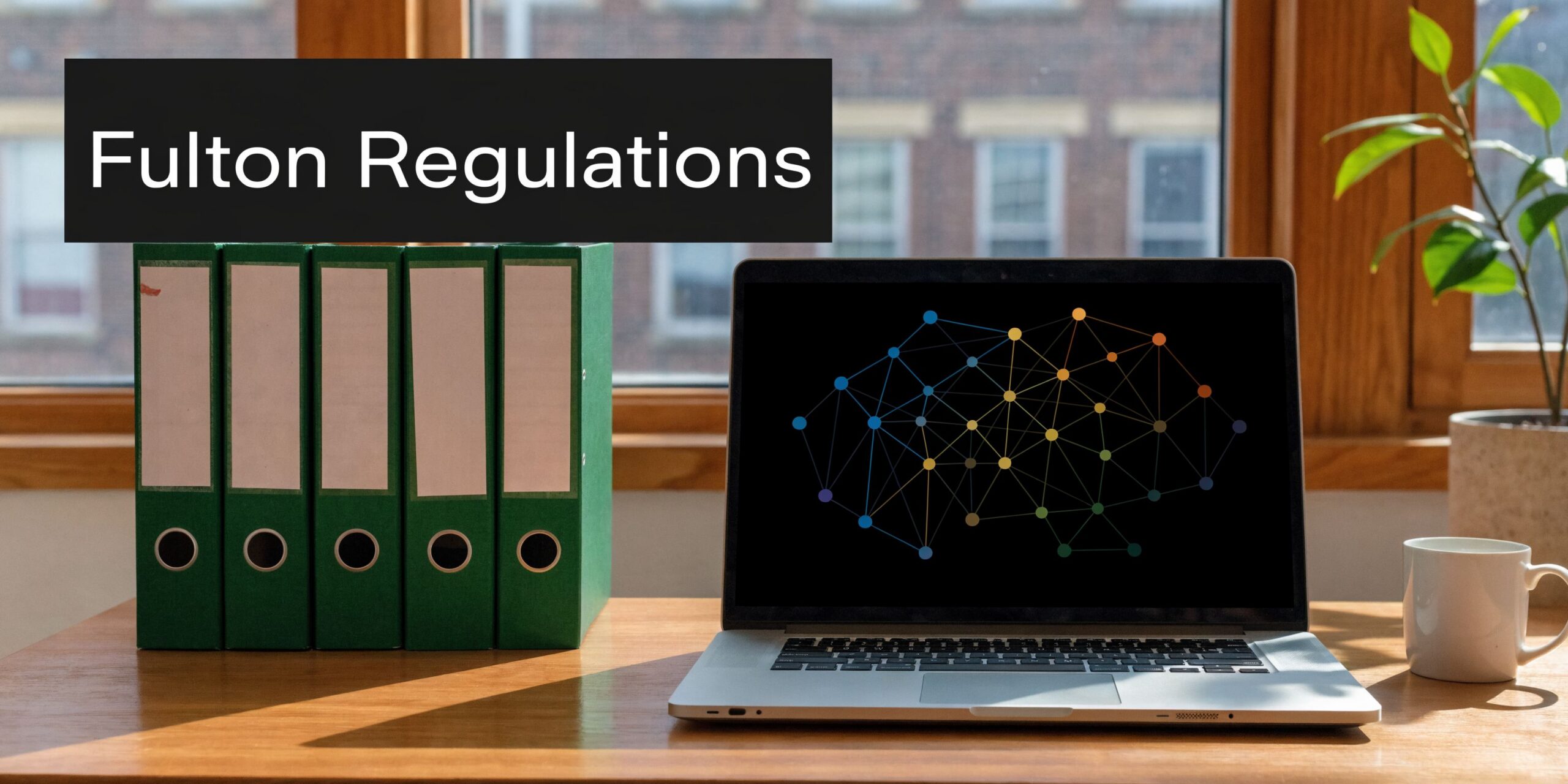 A laptop with a neural network display sits on a desk next to green binders and a plant.